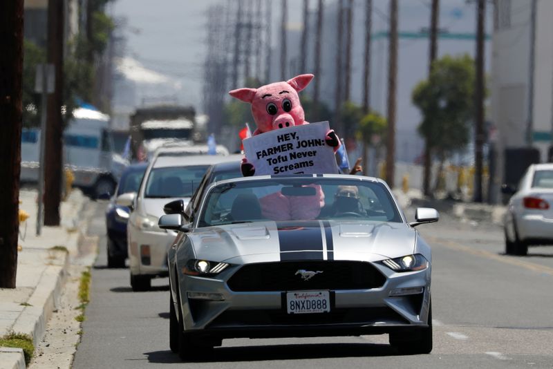 © Reuters. PETA protest during COVID-19 outbreak in California