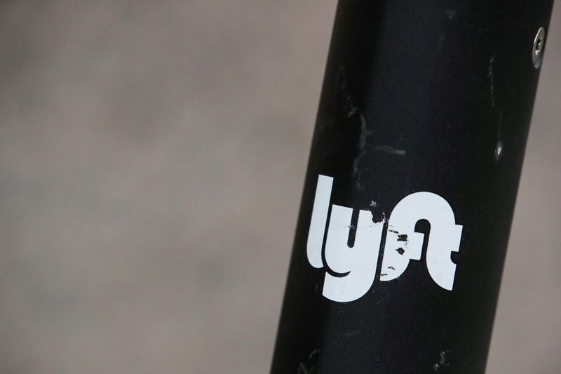 &copy; Reuters. The Lyft  logo is seen on a parked Lyft Scooter in Washington