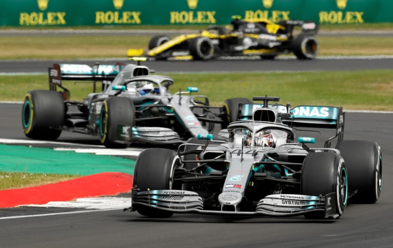 &copy; Reuters. FILE PHOTO: Mercedes&apos; drivers Lewis Hamilton and Valtteri Bottas in action at the 2019 British Grand Prix at Silverstone
