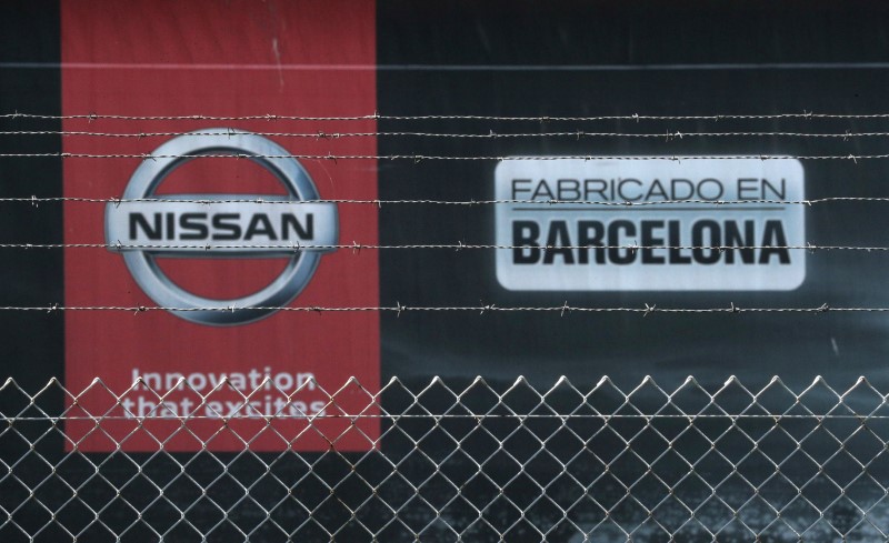 © Reuters. FILE PHOTO:  The logo of Nissan is seen through a fence at Nissan factory at Zona Franca during the coronavirus disease (COVID-19) outbreak in Barcelona