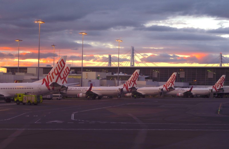 &copy; Reuters. FILE PHOTO: FILE PHOTO: Aircraft from Australia&apos;s second largest airline, Virgin Australia, sit on the tarmac at the domestic terminal of Sydney Airport