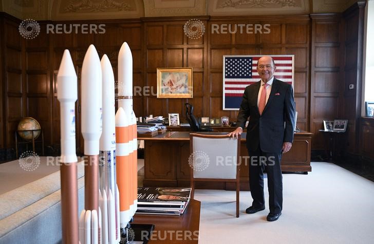&copy; Reuters. U.S. Secretary of Commerce Ross poses near rocket models during Reuters interview in his office at the U.S. Department of Commerce building in Washington