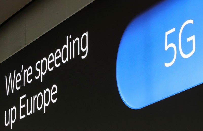 © Reuters. An advertising board shows a 5G logo at the International Airport in Zaventem