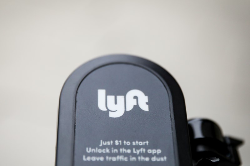 &copy; Reuters. The Lyft  logo is seen on a parked Lyft Scooter in Washington