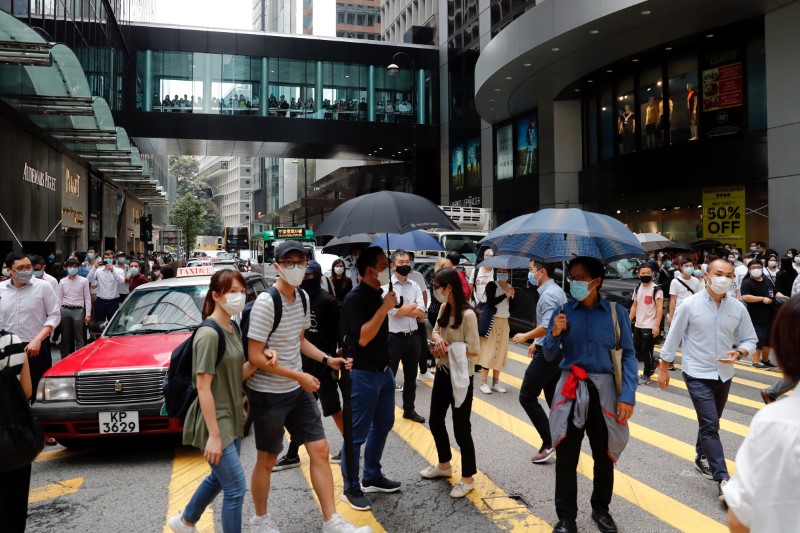 &copy; Reuters. Anti-government demonstrators take part in a protest during a lunch time in Hong Kong