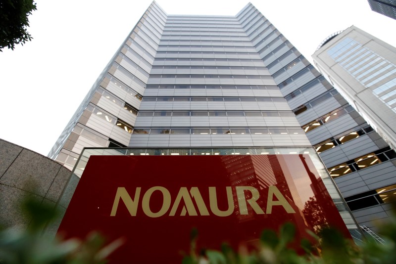 &copy; Reuters. FILE PHOTO: Logo of Nomura Securities is pictured at the company&apos;s Otemachi Head Office in Tokyo