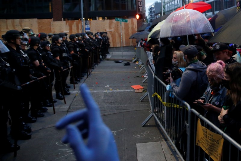 &copy; Reuters. Protesters rally against the death in Minneapolis police custody of George Floyd, in Seattle