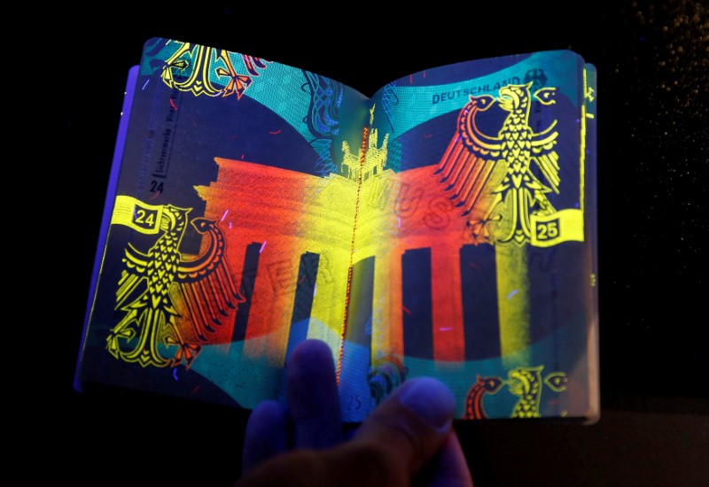 &copy; Reuters. FILE PHOTO: The new German electronic passport is pictured under an ultraviolet light during its presentation to the media in Berlin