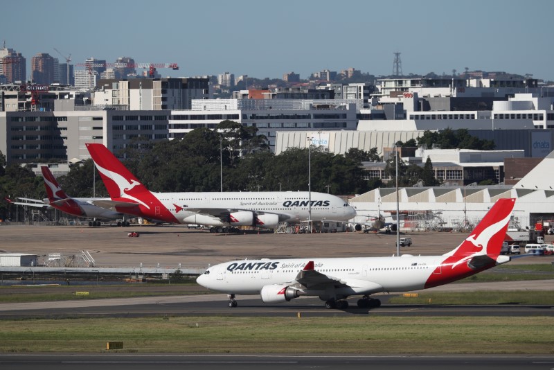 &copy; Reuters. FILE PHOTO: Qantas planes are seen at Kingsford Smith International Airport in Sydney