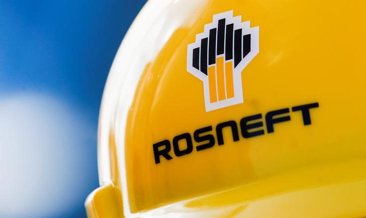 &copy; Reuters. Rosneft logo is pictured on a safety helmet in Vung Tau