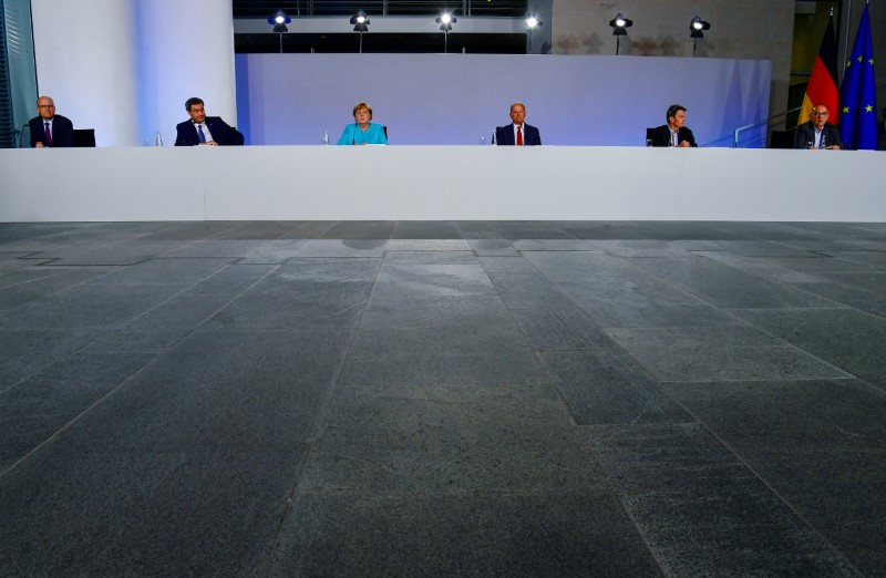 &copy; Reuters. News conference after coalition meetings over stimulus measures in Berlin