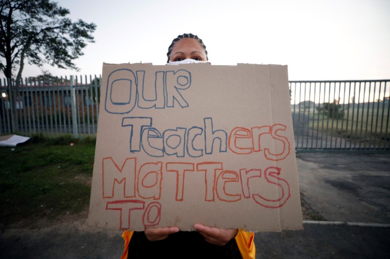 &copy; Reuters. Parents and community members protest against the return of learners to school during the coronavirus disease (COVID19) outbreak in Cape Town