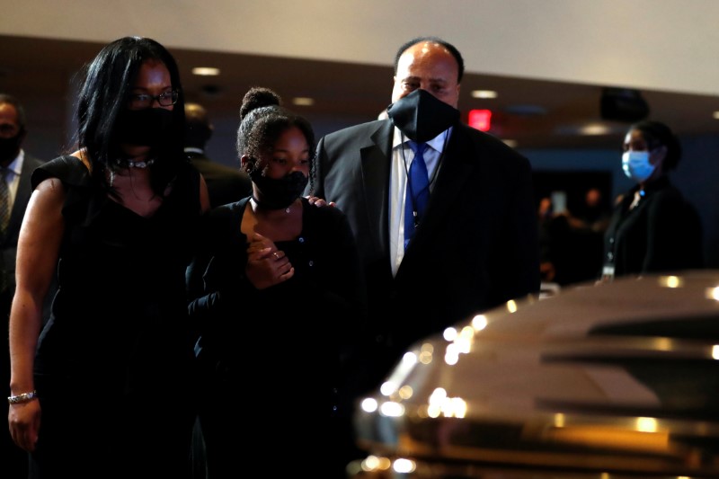 © Reuters. Martin Luther King III are seen during a memorial service for George Floyd following his death in Minneapolis police custody, in Minneapolis