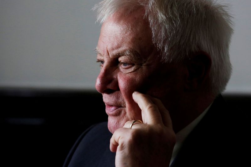 &copy; Reuters. FILE PHOTO: Former Hong Kong governor Chris Patten attends an interview in Hong Kong