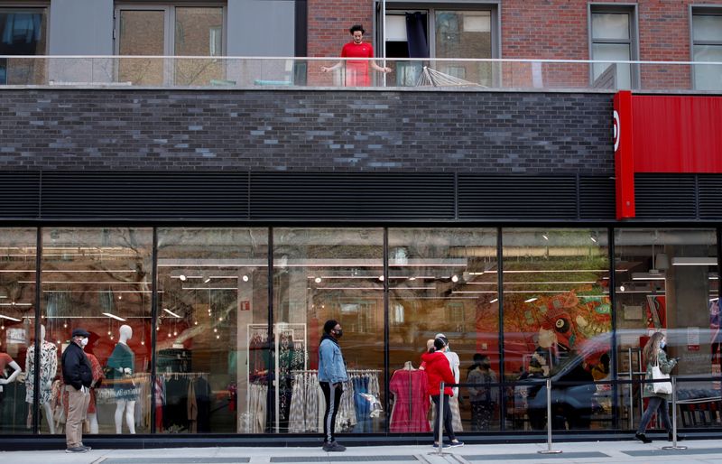 &copy; Reuters. FILE PHOTO: A man jumps rope above a Target store as shoppers wait at a social distance during outbreak of coronavirus disease (COVID-19) in New York