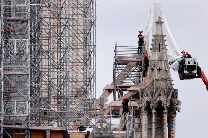 &copy; Reuters. Works on Notre Dame Cathedral in Paris