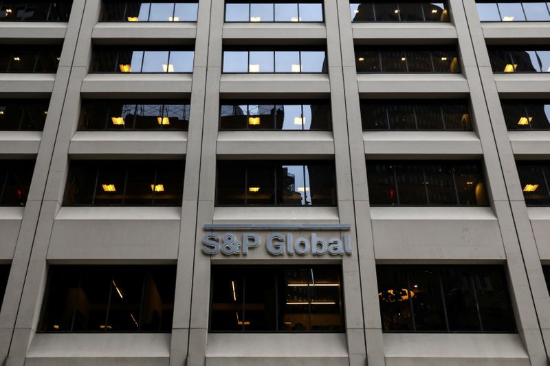 &copy; Reuters. The S&amp;P Global logo is displayed on its offices in the financial district in New York