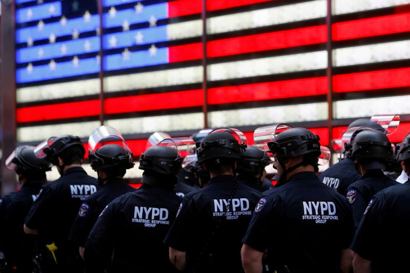 &copy; Reuters. Protesters rally against the death in Minneapolis police custody of George Floyd, in Times Square in New York