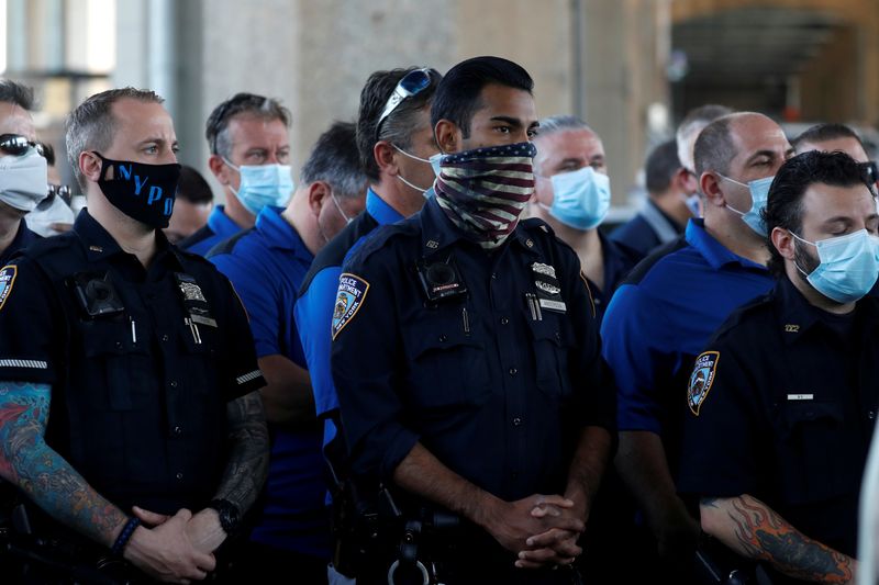 © Reuters. Uniformed officers of the New York City Police Department attend News Conference in New York