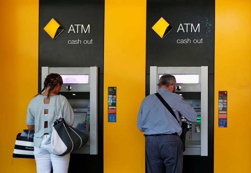 &copy; Reuters. People use Commonwealth Bank of Australia (CBA) bank ATMs in Sydney