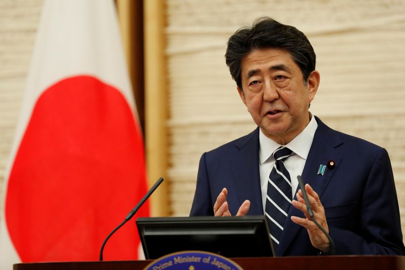 &copy; Reuters. Japan&apos;s Prime Minister Shinzo Abe speaks at a news conference in Tokyo