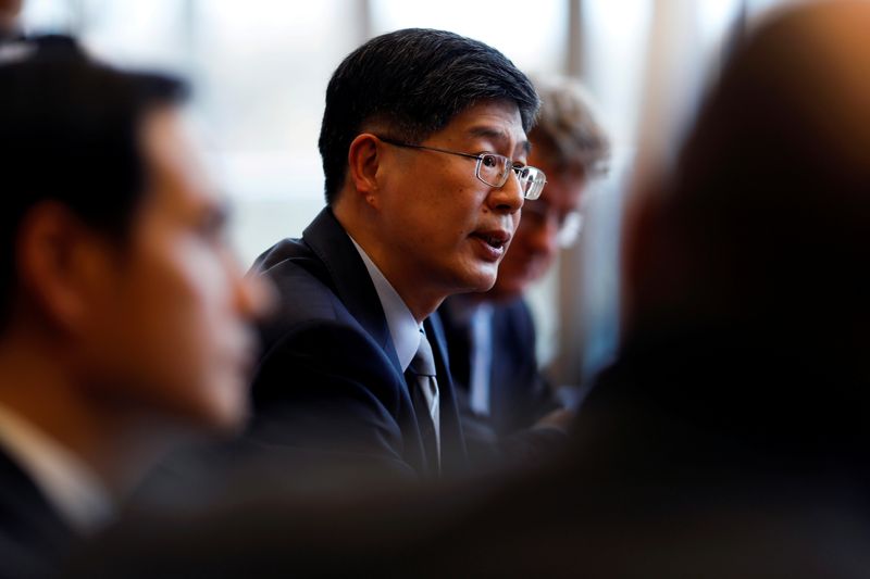 &copy; Reuters. FILE PHOTO: China&apos;s new ambassador to Canada Cong Peiwu speaks during a news conference for a small group of reporters at the Chinese Embassy in Ottawa