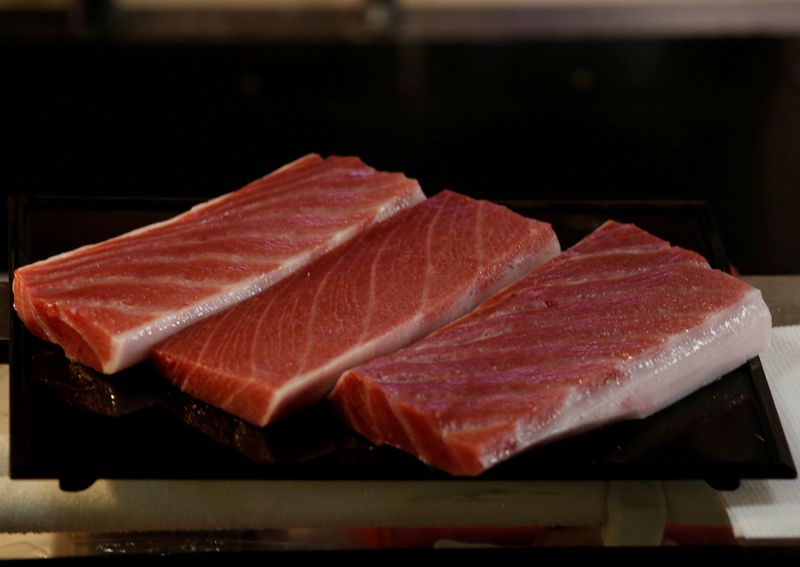 &copy; Reuters. FILE PHOTO: Meat from a 278kg bluefin tuna, priced with a bid over $3 million at Toyosu fish market&apos;s first tuna auction of the year, is pictured at Sushi Zanmai restaurant in Tokyo, Japan