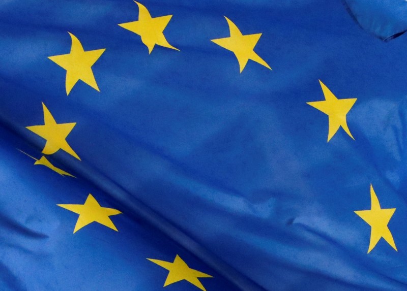 © Reuters. FILE PHOTO: A European flag is seen outside the EU Commission headquarters in Brussels