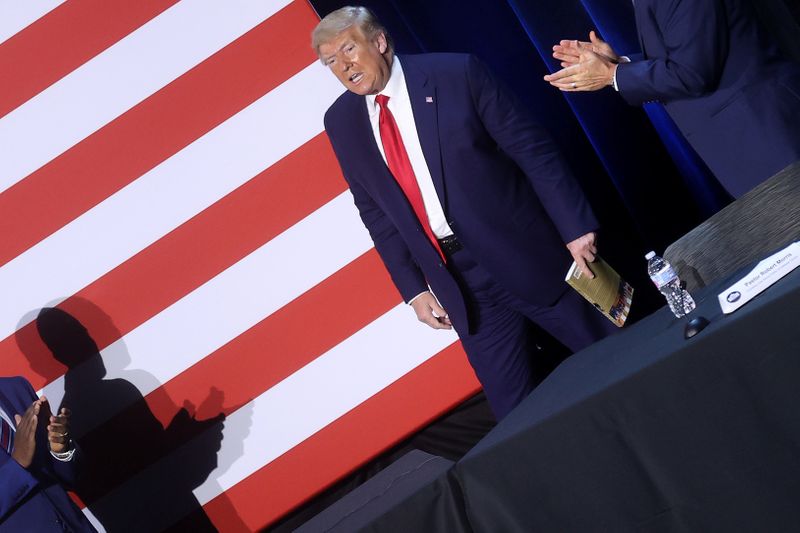 &copy; Reuters. U.S. President Trump is applauded by participants after a roundtable discussion with supporters and civic leaders at Gateway Church in Dallas, Texas