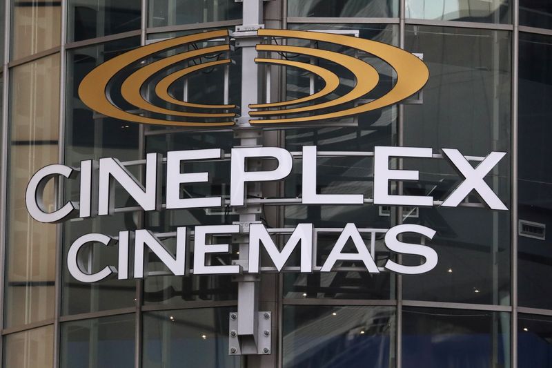 &copy; Reuters. FILE PHOTO: A Cineplex movie theatre sign looms over Yonge street in Toronto