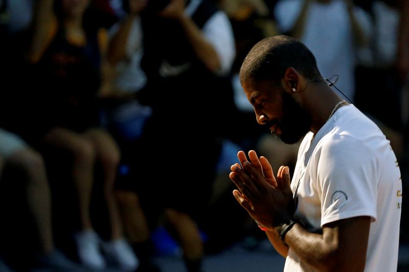 &copy; Reuters. FILE PHOTO:  NBA player Kyrie Irving of the Cleveland Cavaliers reacts during a promotional event in Taipei