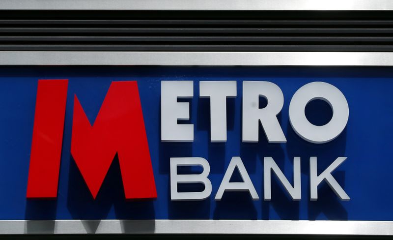 &copy; Reuters. Signage is seen outside of a Metro Bank in London