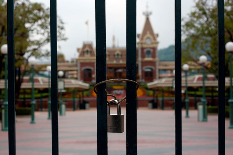 &copy; Reuters. FILE PHOTO: A locked gate is seen after the Hong Kong Disneyland theme park closed due to the coronavirus outbreak