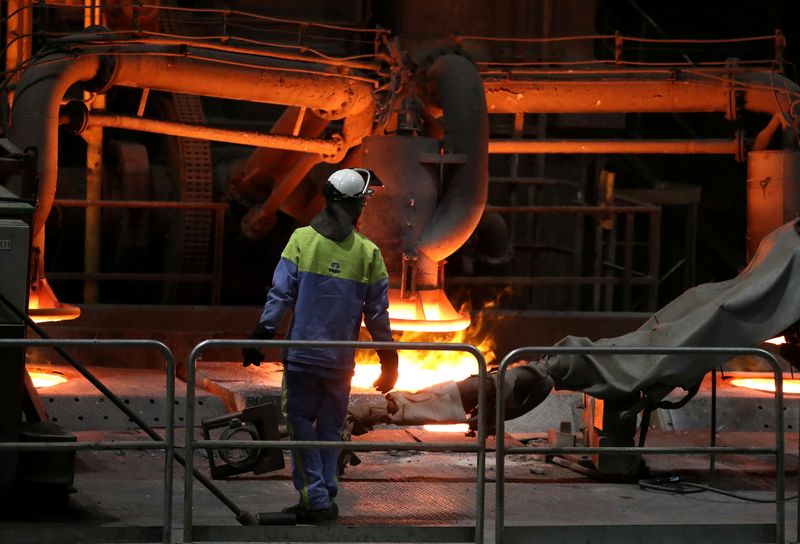 &copy; Reuters. FILE PHOTO: A worker at the Tata steel plant in Ijmuiden