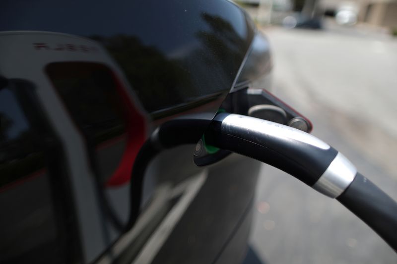 © Reuters. A Tesla is charged at an electric car supercharger station in Los Angeles