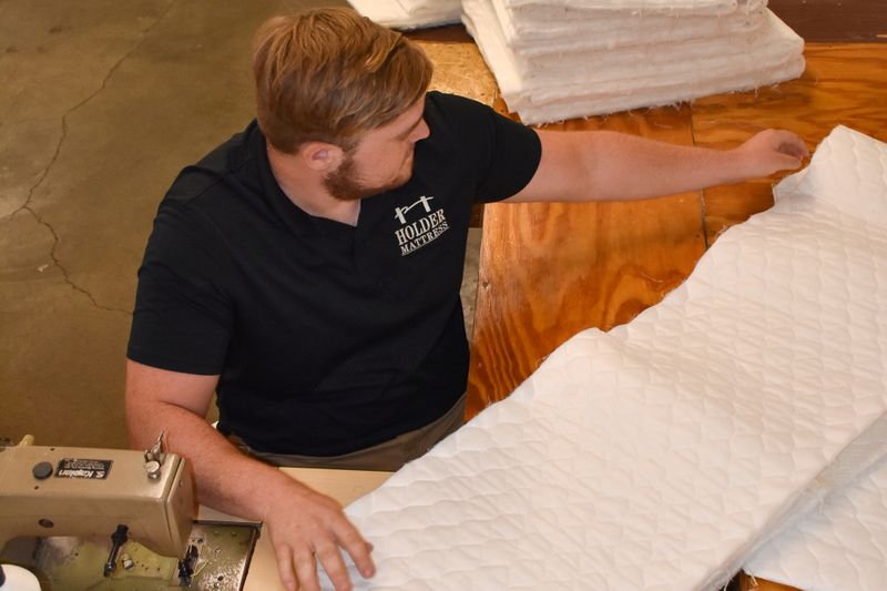 &copy; Reuters. Mattress technician Ben Freygang works in Kokomo, Indiana