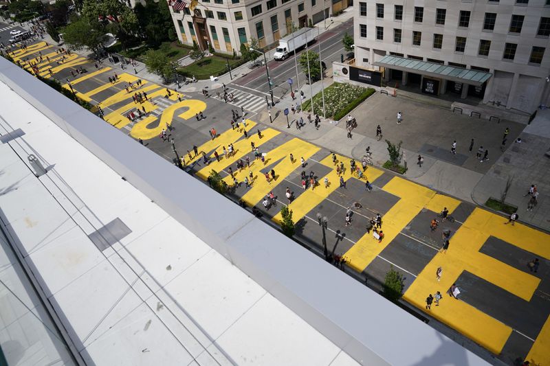 © Reuters. Black Lives Matter painting is seen on street as protests against racial inequality continue in Washington