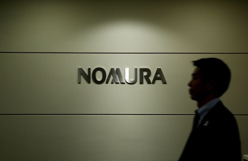 © Reuters. FILE PHOTO: Logo of Nomura Securities is pictured at the company's Otemachi head office in Tokyo