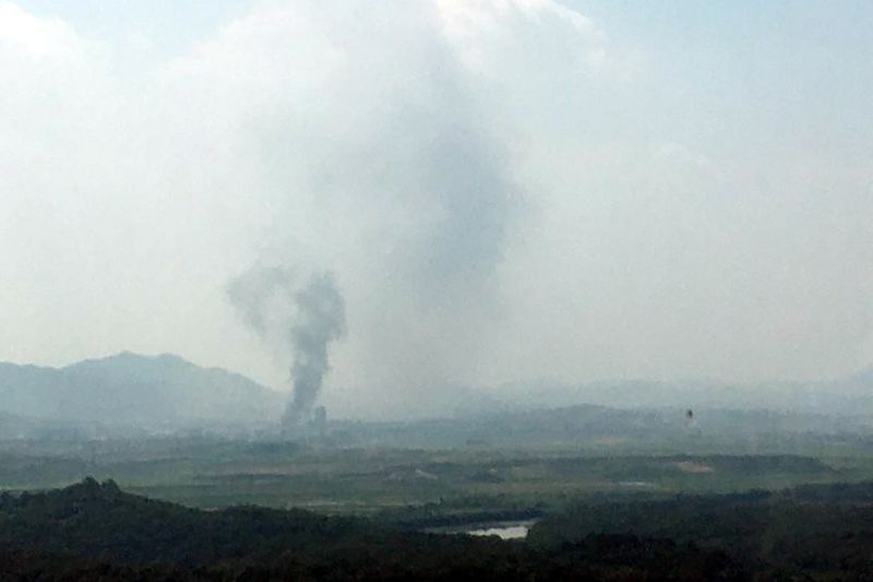 © Reuters. A smoke rises from Kaesong Industrial Complex in this picture taken from the south side in Paju