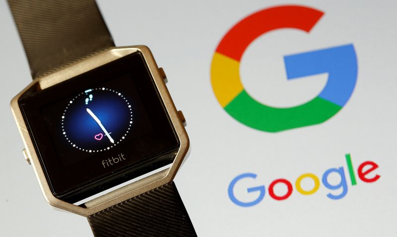 &copy; Reuters. Fitbit Blaze watch is seen in front of a displayed Google logo in this illustration