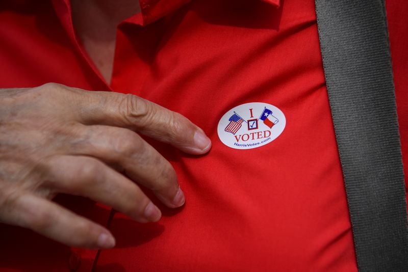 &copy; Reuters. Voters cast their ballot in the Democratic primary election in Houston