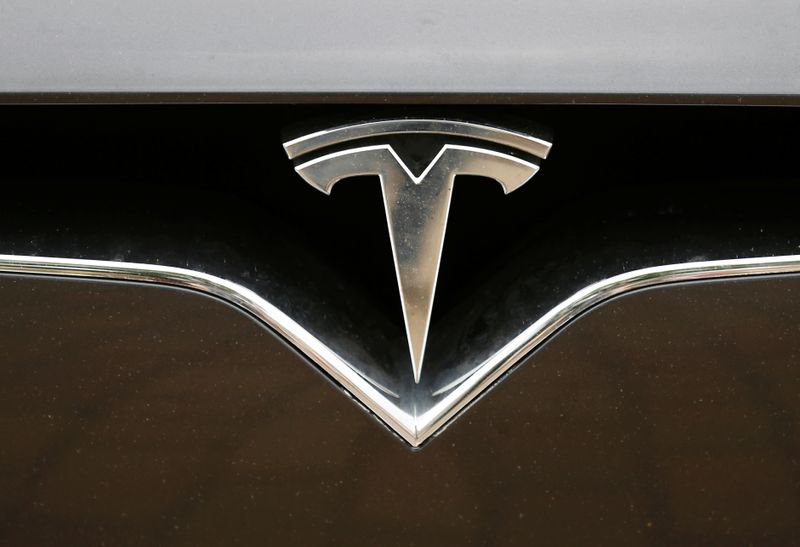 &copy; Reuters. Tesla logo is pictured on a car during electric car E-Rallye Baltica 2019 in Bauska,