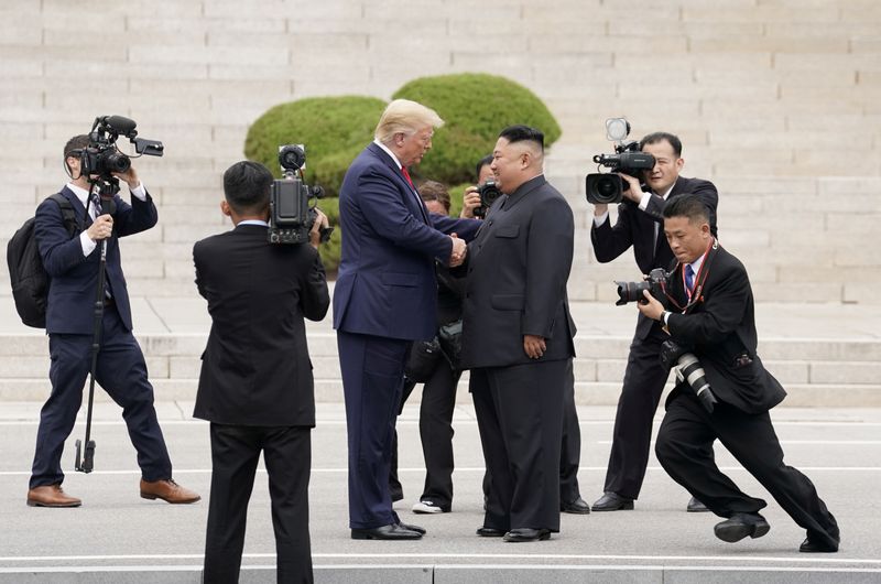 &copy; Reuters. FILE PHOTO: File picture of U.S. President Donald Trump meeting North Korean leader Kim Jong Un