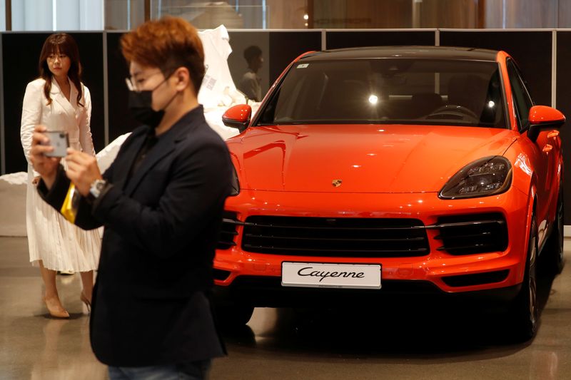 &copy; Reuters. A Porsche Cayenne Coupe is seen on display at its dealership during a news conference in Seoul