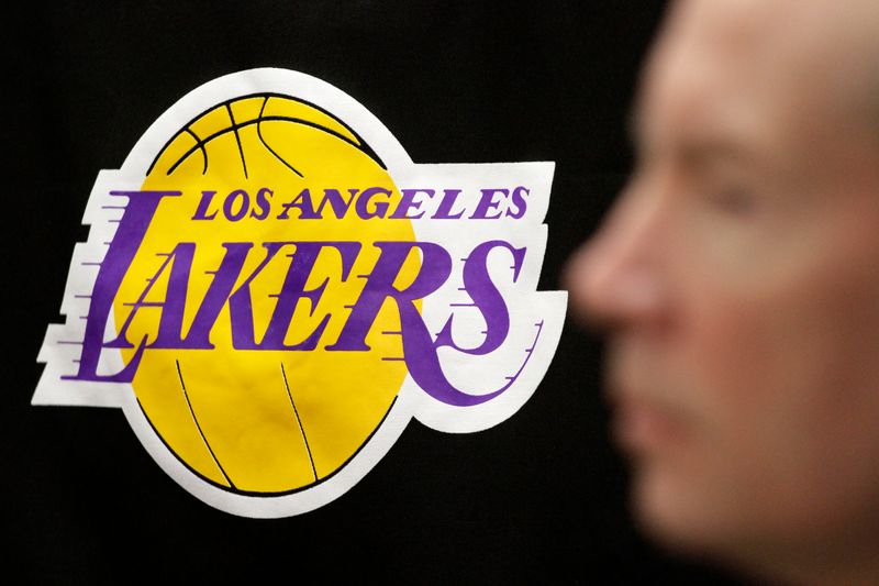 &copy; Reuters. FILE PHOTO:  The Los Angeles Lakers logo is pictured past the profile of Lakers spokesman John Black during a news briefing regarding the death of longtime Lakers owner Jerry Buss, at the Lakers&apos; practice facility in El Segundo