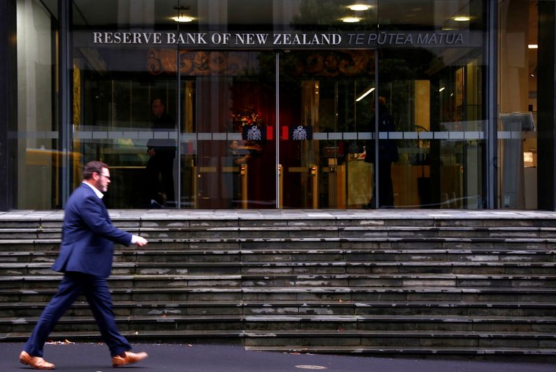 &copy; Reuters. A pedestrian walks past the main entrance to the Reserve Bank of New Zealand located in central Wellington, New Zealand