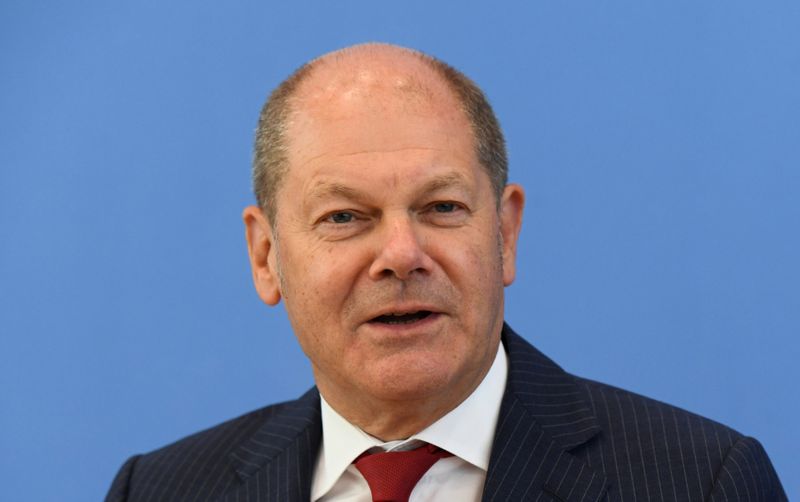 &copy; Reuters. German Finance Minister Olaf Scholz attends a news conference in Berlin