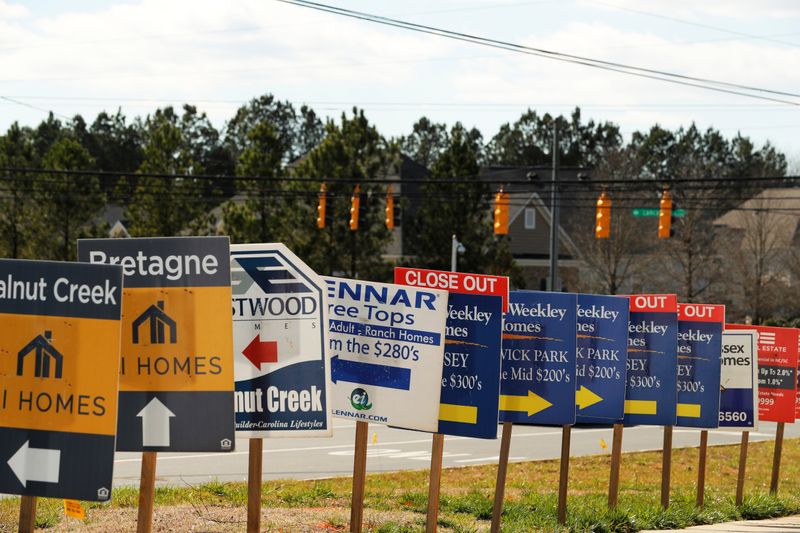 &copy; Reuters. Real estate signs advertise new homes for sale in multiple new developments in York County, South Carolina