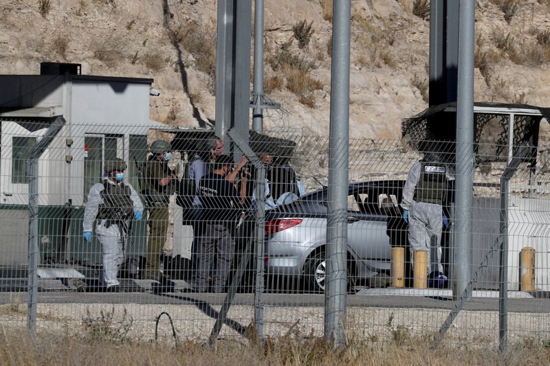 &copy; Reuters. Scene of a Palestinian ramming attack at an Israeli military checkpoint near the town of Abu Dis