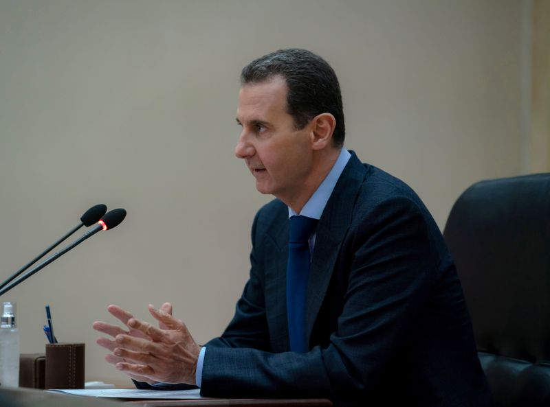 © Reuters. Syrian President Bashar al-Assad addresses the government committee that oversees measures to curb the spread of the coronavirus disease (COVID-19), in Damascus